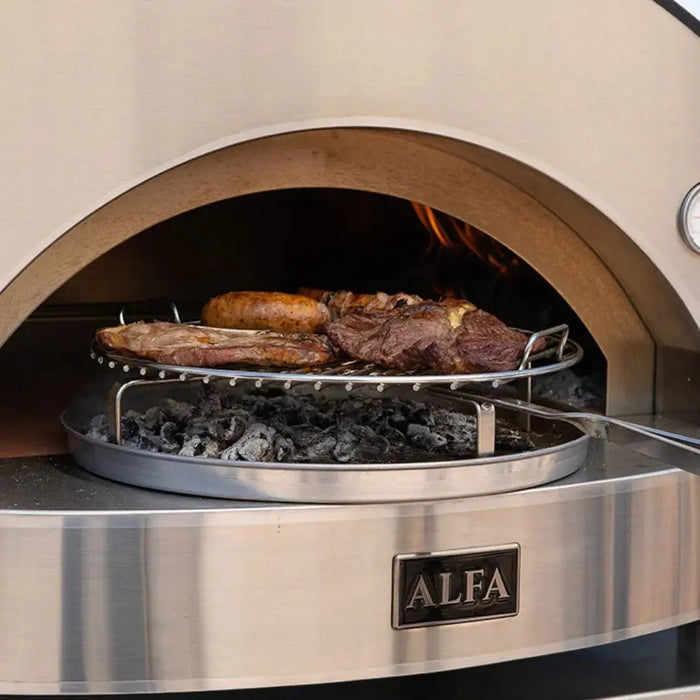 Wood-fired pizza oven with ALFA branding, cooking meats on a metal rack.