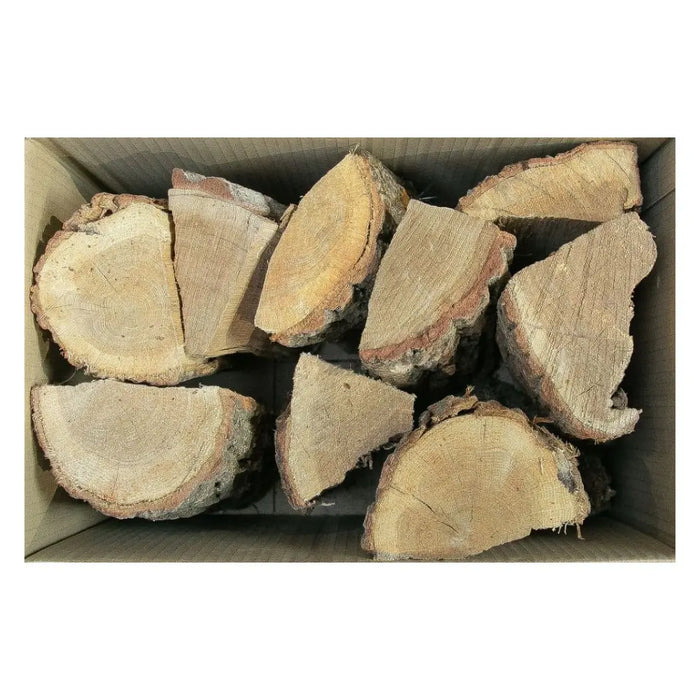 kiln dried oak logs in a box