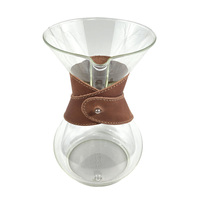 Side view of Hide & Drink Chemex Collar in brown leather that fits a glass coffee maker perfectly. Designed for pour over coffee, compatible with Chemex 6-Cup Glass, handmade by artisans in La Antigua Guatemala & Oaxaca Mexico.