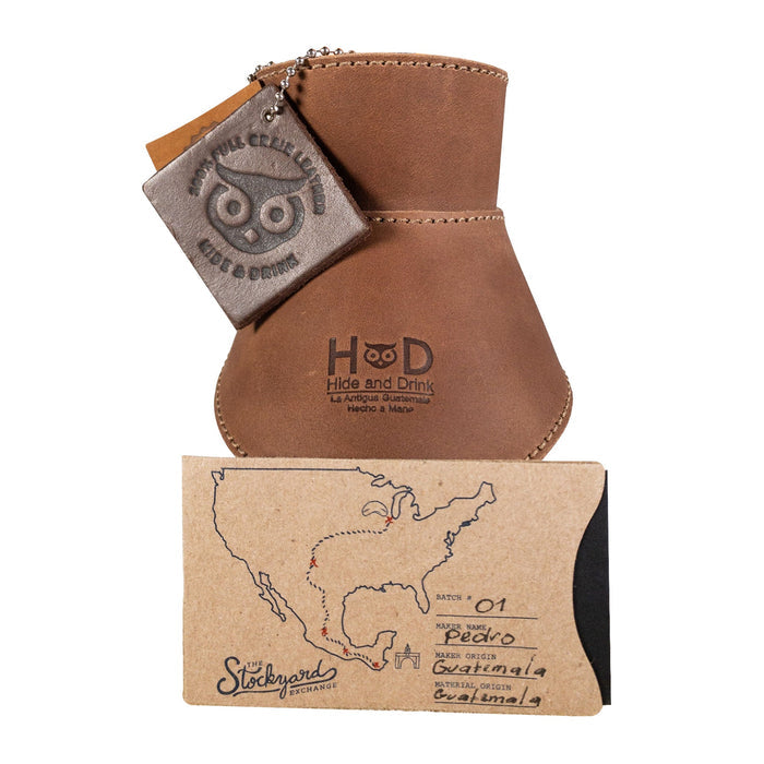 View of Hide & Drink Chemex Collar in navy leather on a coffee maker, emphasizing its stylish design. This collar is ideal for pour over coffee compatible with Chemex 6-Cup Glass, handmade in La Antigua Guatemala & Oaxaca Mexico.