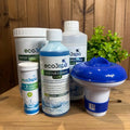 Collection of eco3spa hot tub care products on a wooden surface with a plant in the background.