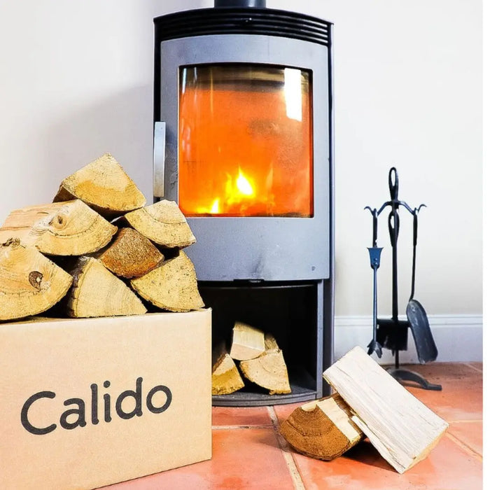 kiln dried ash logs in front of a stove