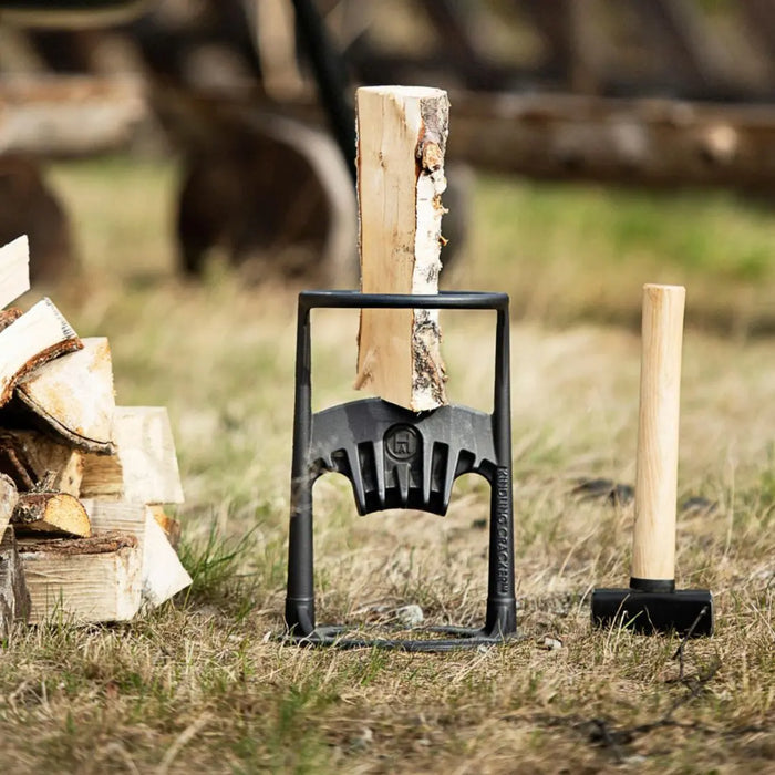 Kindling Cracker Original in use with hammer beside it