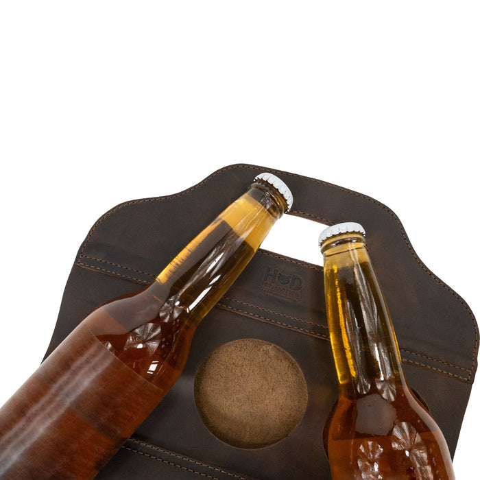 Close-up of Hide & Drink's Six Bottle Caddy with beer bottles, emphasizing its use as a Beer Holster for Bike. Made from durable Full Grain Leather, this artisan piece epitomizes Small Batch Production and is carefully hand cut and hand sewn.