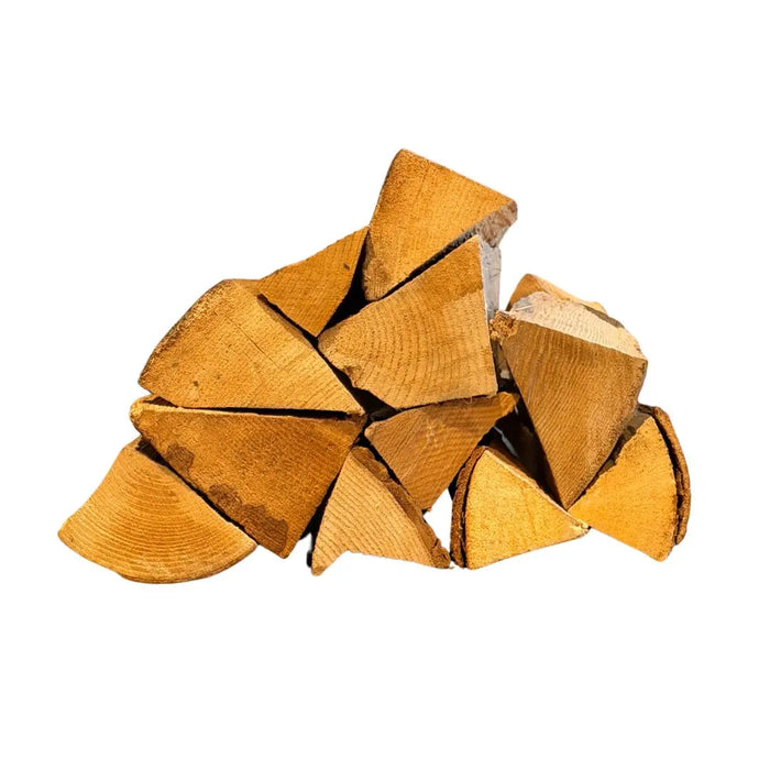 Stack of kiln dried ash cooking logs firewood on a white background