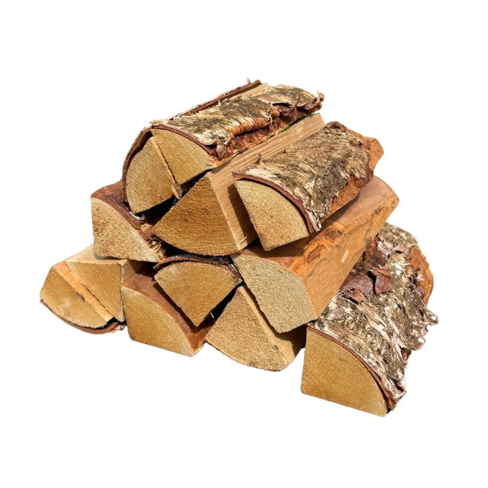 Stack of chopped birch kiln dried cooking logs for pizza oven on a white background