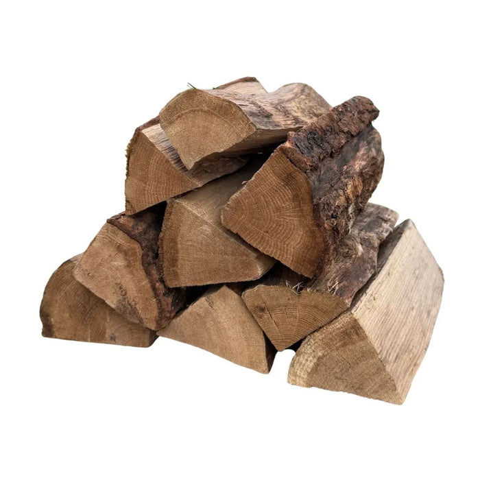 Stack of oak kiln dried cooking logs for pizza oven on a white background
